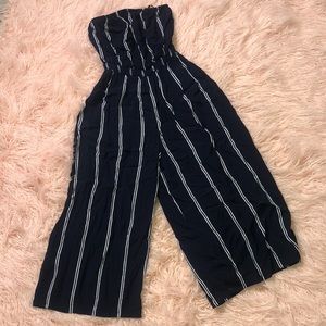 Navy/white strapless cinch waist romper.